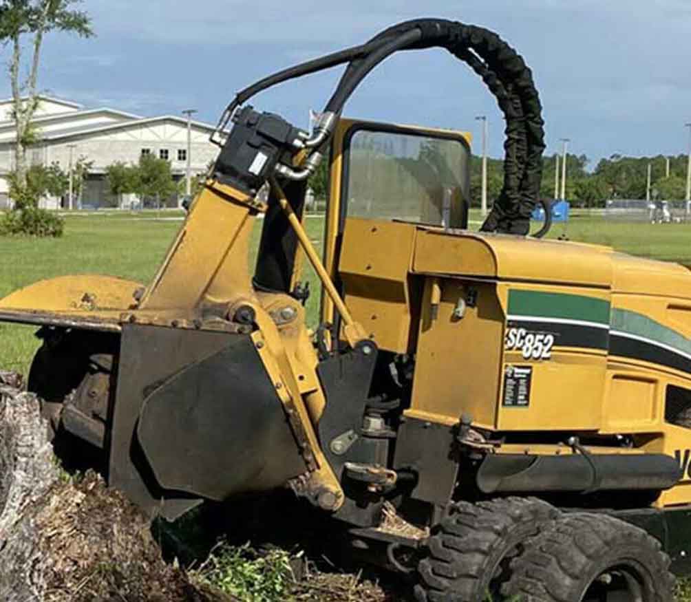 Stump grinder with its cutting wheel raised